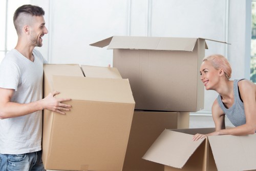 Packing supplies and labelled boxes prepared for house removals in Oldcoulsdon